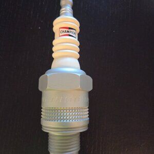 Vintage promotional Champion sparkplug radio.